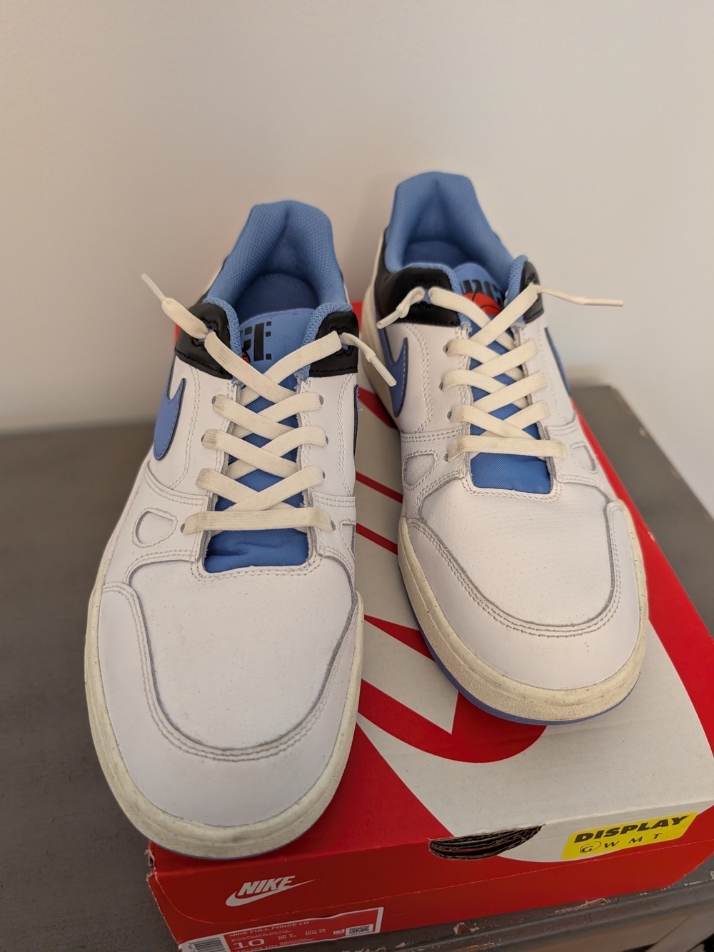 Nike Men’s White Sneakers with Blue Accents